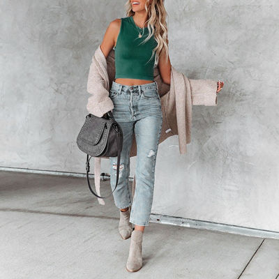 Exquisita camiseta sin mangas de mujer con estilo de color sólido