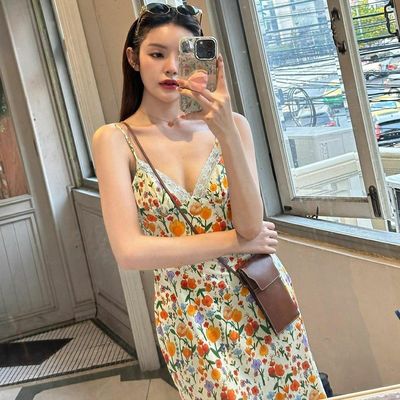 Verano nuevo impresión de moda sexy sin espalda vestido de encaje de correa