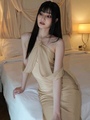 Verano nuevo estilo estilo extranjero falda de corbata sexy sin espalda temperamento delgado vestido brillante