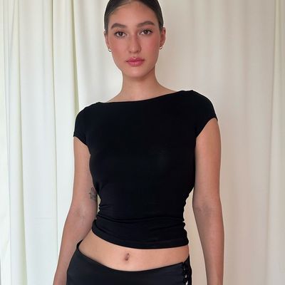 Sexy sexy delgada sin espalda cortos de cultivo estilo callejero de manga corta mujer de camiseta