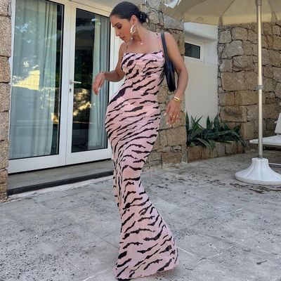 La nueva moda de verano sexy sin espalda vestido con correa delgada