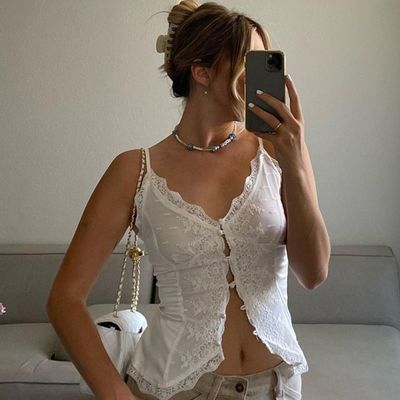 Estilo femenino American Spice Girl encaje encaje sexy de cuello en V camiseta de hebilla correa chaleco pequeño chaleco